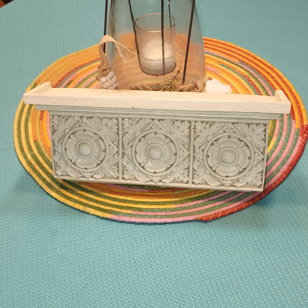 Hermitage off white poly resin floral shelf